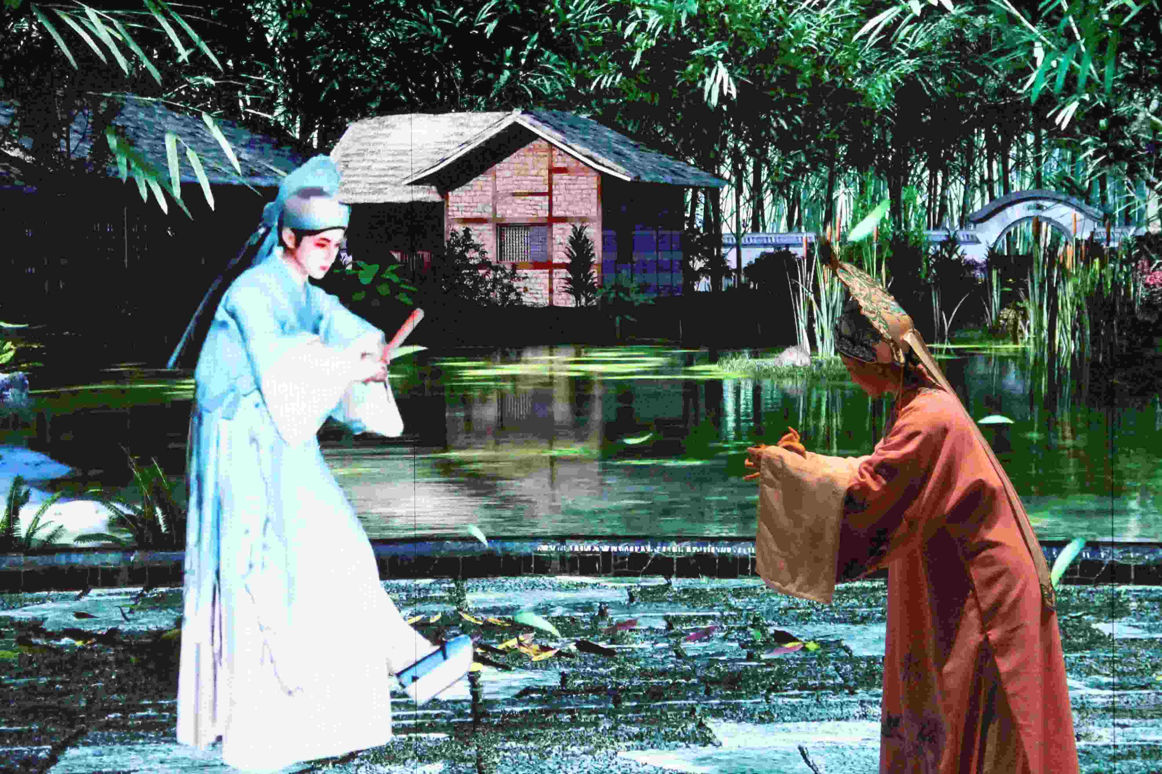 真人演員與虛擬人演員在“元啟金陵”南京數(shù)字文化客廳出演《梁山伯與祝英臺(tái)》經(jīng)典選段。受訪者供圖